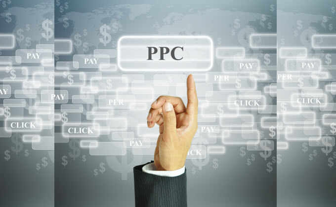 A hand is pointing at a PPC button.