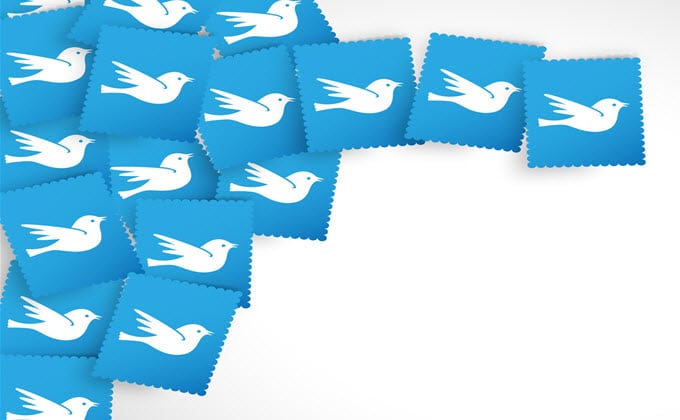 A group of blue doves on a piece of papers.