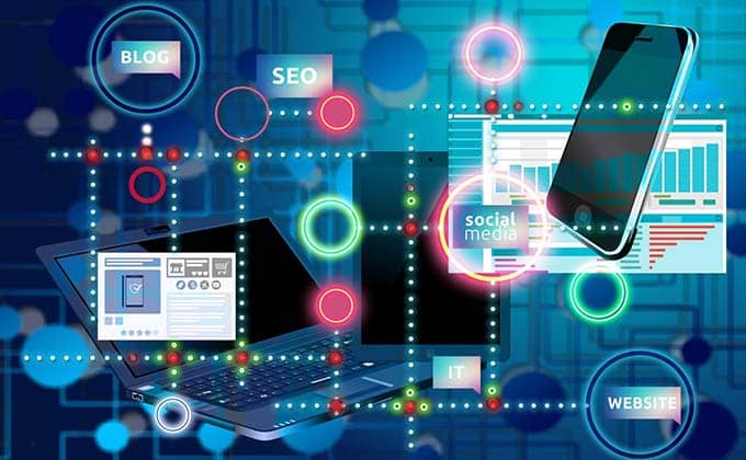 An image of a laptop and cell phone.